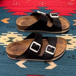 Black Birkenstock Arizona Soft Footbed Sandals with White Buckles